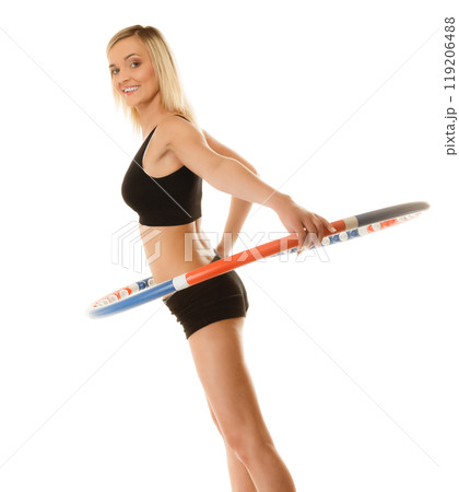 sporty fit girl doing exercise with hula hoop. 119206488