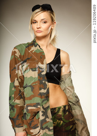 Beautiful woman in military clothes Beautiful woman in military clothes 119206489