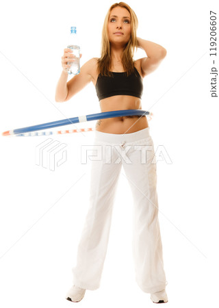 sporty fit girl doing exercise with hula hoop. sporty fit girl doing exercise with hula hoop. 119206607