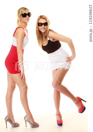 two sexy crazy women in summer clothes sunglasses. 119206625