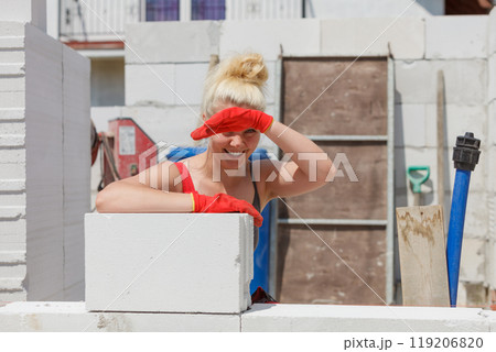 Woman working with airbricks 119206820