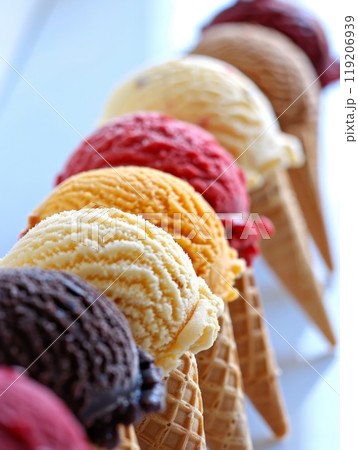 Variety of Ice Cream Scoops in Waffle Cones. A colorful assortment of ice cream scoops in waffle cones, showcasing various flavors in a delightful and appetizing display. 119206939
