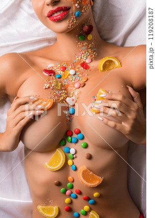 Woman topless with caramel bodyart shot Woman topless with caramel bodyart shot 119208187