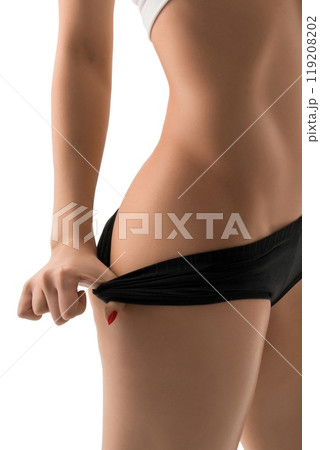 Sexy blonde in top and tanga isolated view 119208202