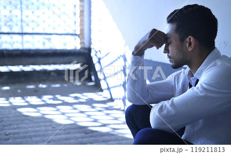 Stress, depression and fired businessman frustrated in office building for bankruptcy, fail or disaster. Headache, termination and salesman overthinking wrong resignation choice in inflation crisis 119211813