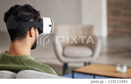 Man, sofa and virtual reality glasses for interior design software, metaverse and user experience online. Person back on couch or living room for home VR, high technology and futuristic vision Man, sofa and virtual reality glasses for interior design software, metaverse and user experience online. Person back on couch or living room for home VR, high technology and futuristic vision 119211892