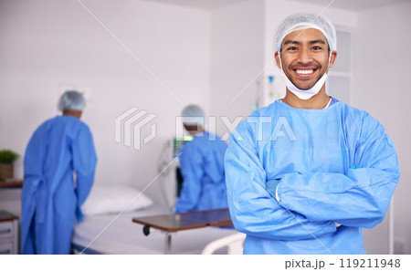 Happy asian man, doctor and arms crossed of professional in ICU with medical team for healthcare service at hospital. Portrait of male person, surgeon or nurse smile in confidence or health at clinic 119211948