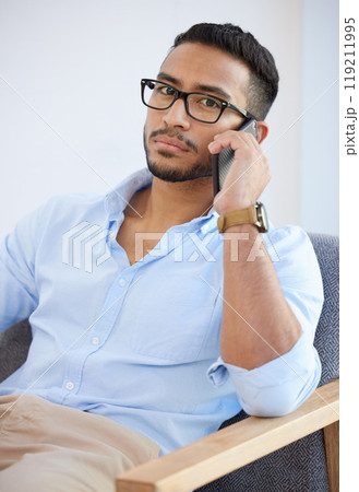 Man, phone call and portrait in office at startup for conversation, deal or contact at company. Entrepreneur, business owner and cellphone for networking, negotiation or chat at creative media agency Man, phone call and portrait in office at startup for conversation, deal or contact at company. Entrepreneur, business owner and cellphone for networking, negotiation or chat at creative media agency 119211995