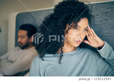 Couple, fight and stress in bedroom for divorce, anger and thinking of breakup, cheating and anxiety. Face of frustrated, sad and depressed woman with partner in bed for conflict, argument and drama 119212047
