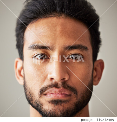 Face, portrait and serious asian man in studio with focus, wellness and awareness. Headshot of a young male model isolated on a grey background with concentration, vision and stern expression Face, portrait and serious asian man in studio with focus, wellness and awareness. Headshot of a young male model isolated on a grey background with concentration, vision and stern expression 119212469
