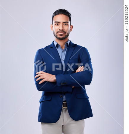 Portrait, serious and business man with arms crossed in studio isolated on a white background mockup space. Professional, entrepreneur and confident worker, employee and Mexican consultant in suit. Portrait, serious and business man with arms crossed in studio isolated on a white background mockup space. Professional, entrepreneur and confident worker, employee and Mexican consultant in suit. 119212524