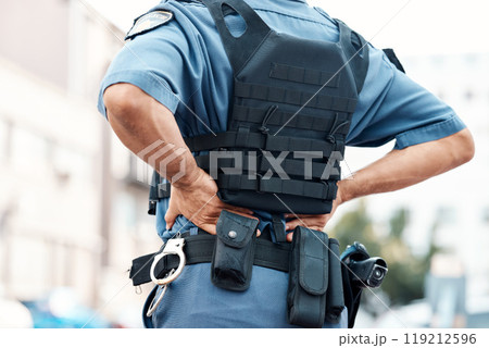 Back pain, man or police officer with injury in city from accident crime, crisis danger or gunshot emergency. Law closeup, injured or security guard with painful joint, inflammation or wound in town 119212596
