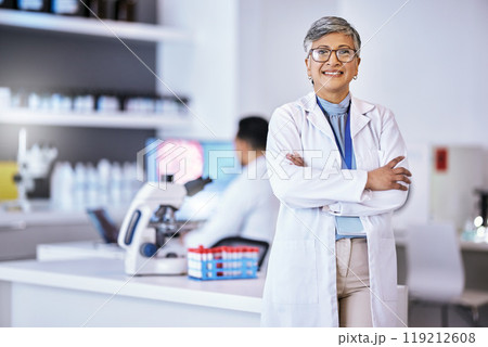 Portrait, research and senior woman with arms crossed, medical and success with lab equipment, smile and development. Female person, confident and healthcare professional with science and innovation 119212608
