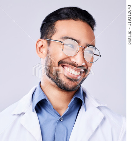 Happy, smile and man doctor in a studio with glasses for vision, eye care and wellness. Pride, confidence and headshot of an Indian male healthcare professional with spectacles by white background. 119212643