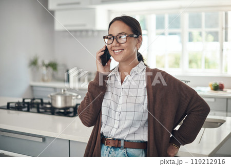 Asian, happy woman or phone call in home talking or speaking in kitchen for communication. Chat, mobile or Japanese female person with smile in conversation to relax in a house or apartment on break Asian, happy woman or phone call in home talking or speaking in kitchen for communication. Chat, mobile or Japanese female person with smile in conversation to relax in a house or apartment on break 119212916