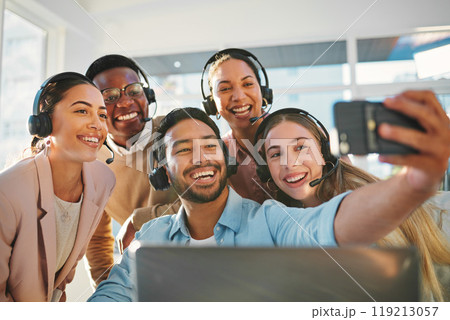 Telemarketing, employee and selfie in office or smile, consultant or bond together. Diversity colleagues, support service and happy face for call center collaboration, workplace or team building fun Telemarketing, employee and selfie in office or smile, consultant or bond together. Diversity colleagues, support service and happy face for call center collaboration, workplace or team building fun 119213057