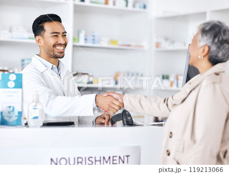 Pharmacist, doctor and people handshake for pharmacy, medical support and customer service at desk. Professional healthcare worker and woman shaking hands, thank you and success in medicine or retail Pharmacist, doctor and people handshake for pharmacy, medical support and customer service at desk. Professional healthcare worker and woman shaking hands, thank you and success in medicine or retail 119213066