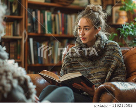 A person providing tech support to an elderly neighbor. 119213592