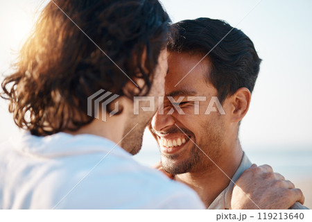 Love, sunshine and gay men on beach, embrace and laugh on summer vacation together in Thailand. Sunshine, ocean and island, happy lgbt couple hug in nature on fun holiday with pride, sea and smile. 119213640