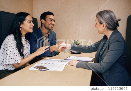Handshake, finance advisor and couple with documents for insurance, mortgage investment and loan application. Financial, consultant and man and women with paperwork for agreement, deal and contract Handshake, finance advisor and couple with documents for insurance, mortgage investment and loan application. Financial, consultant and man and women with paperwork for agreement, deal and contract 119213645