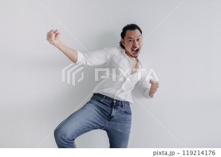 Winner face long hair man bun in white shirt and jean stand on white. 119214176