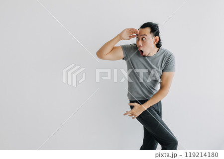 Unexpected surprise face man walking and turn on isolated background. Full body. Unexpected surprise face man walking and turn on isolated background. Full body. 119214180