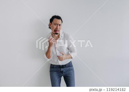 Fear face long hair man bun in white shirt and jean stand on white. 119214182