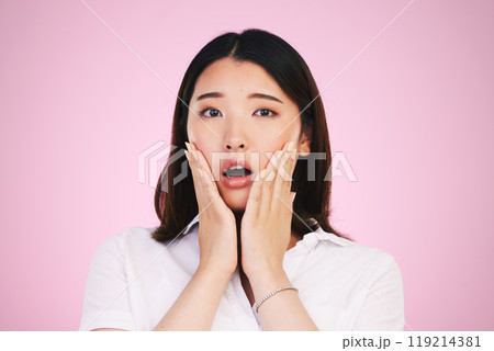 Surprise, wow and hands on woman face in studio with anxiety for fake news, drama or secret on pink background. Omg, portrait and Japanese female model shocked by gossip, announcement or emoji info Surprise, wow and hands on woman face in studio with anxiety for fake news, drama or secret on pink background. Omg, portrait and Japanese female model shocked by gossip, announcement or emoji info 119214381