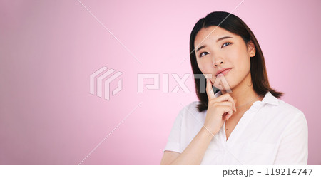 Asian woman, thinking and decision on mockup in problem solving against a pink studio background. Female person with idea, solution or choice in memory, reminder or brainstorming on mock up space Asian woman, thinking and decision on mockup in problem solving against a pink studio background. Female person with idea, solution or choice in memory, reminder or brainstorming on mock up space 119214747