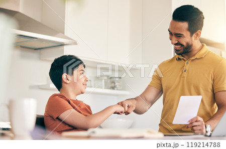 Fist bump, homework and father with child at their home in celebration of completed studying. Happy, smile and young dad bonding together with his boy kid in the kitchen of modern house or apartment. Fist bump, homework and father with child at their home in celebration of completed studying. Happy, smile and young dad bonding together with his boy kid in the kitchen of modern house or apartment. 119214788