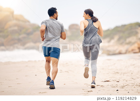 Couple of friends, running and workout on beach for fitness, training and accountability with cardio, race or support. Back of people, athlete or runner by ocean, sea and outdoor for exercise health 119214829