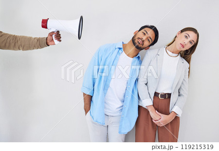 Portrait, megaphone and people at work to listen to a broadcast message on a gray background. Announcement, sound and noise for communication of a news alert or notification with a bullhorn in studio 119215319