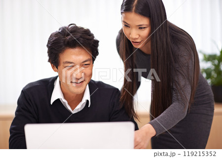 Help, mentor and teamwork on laptop in office with businessman learning from support of woman. Feedback, advice and manager training asian man on computer in collaboration and reading online research 119215352