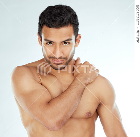 Skincare, body and portrait of asian man in studio for wellness, cosmetics or treatment on white background. Beauty, face and muscular model with hand on shoulder for smooth skin dermatology results 119215659