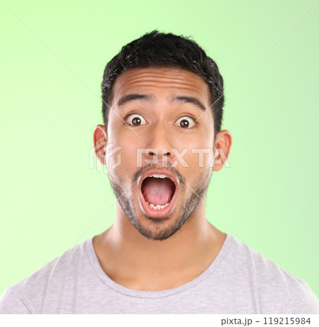 Excited, shock and portrait of man in studio with amazing news, happy announcement and mouth open. Surprise, omg and male person with emoji face for gossip, drama and wow emotion on green background. Excited, shock and portrait of man in studio with amazing news, happy announcement and mouth open. Surprise, omg and male person with emoji face for gossip, drama and wow emotion on green background. 119215984