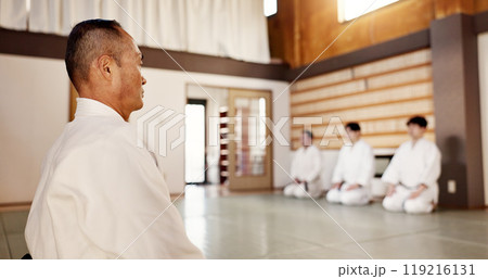 Japanese, men and aikido practice dojo or professional discipline, martial arts or black belt. Sensei, students and gee uniform in Tokyo for fight education as athlete or strong, fit or protection 119216131