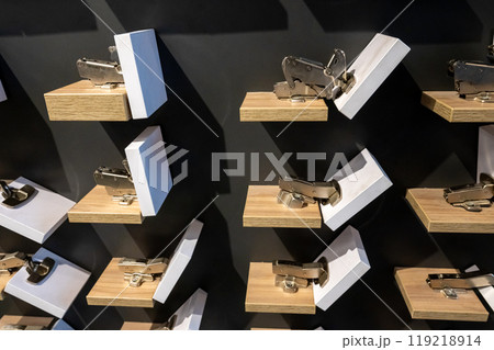 Display of Modern Kitchen Cabinet Hinges on Shelves Display of Modern Kitchen Cabinet Hinges on Shelves 119218914