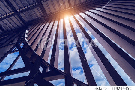 A structure featuring wooden slats on construction site contributing to its architectural style 119219450