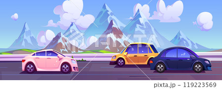 Cars driving on road with mountains in horizon. 119223569