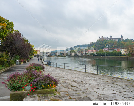 Wuerzburg, Germany - Oktober 19th 2023: View along the walking promenade over the Main river. 119225498
