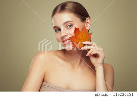 Autumn portrait of beautiful woman with clean fresh skin Autumn portrait of beautiful woman with clean fresh skin 119226151