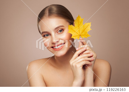 Autumn portrait of beautiful woman with clean fresh skin Autumn portrait of beautiful woman with clean fresh skin 119226163