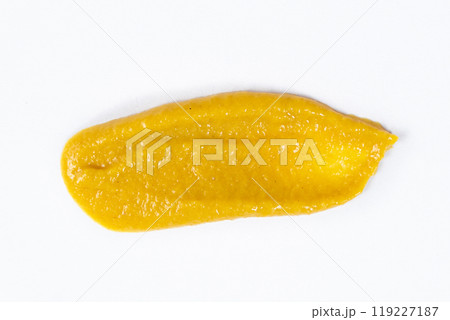 Smear of mustard sauce on white background isolate, creativity in cooking, macro texture Smear of mustard sauce on white background isolate, creativity in cooking, macro texture 119227187
