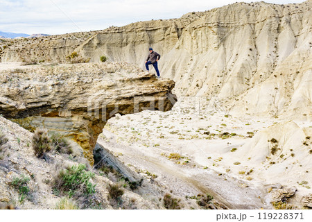 Tourist on Tabernas desert, Spain 119228371