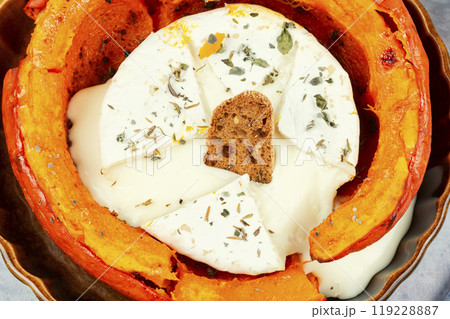 Pumpkin baked with cheese. 119228887