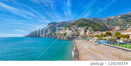Blue sea and beach in Minori, Amalfi Coast, Campania region of Italy. Blue sea and beach in Minori, Amalfi Coast, Campania region of Italy. 119230374