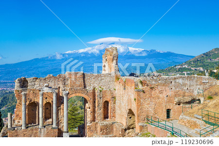 Ancient Greek theatre in Taormina on background of Etna Volcano, Italy Ancient Greek theatre in Taormina on background of Etna Volcano, Italy 119230696