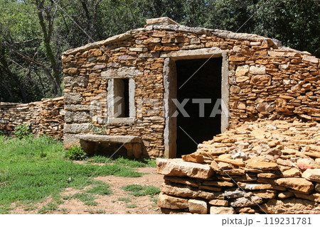 Old and typical stone hut called caborne in French language in Saint Cyr au Mont d'or, France Old and typical stone hut called caborne in French language in Saint Cyr au Mont d'or, France 119231781