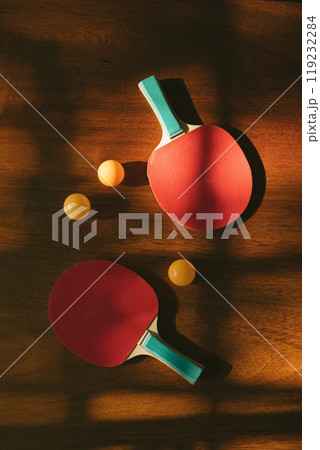 Two ping pong rackets on table Two ping pong rackets on table 119232284
