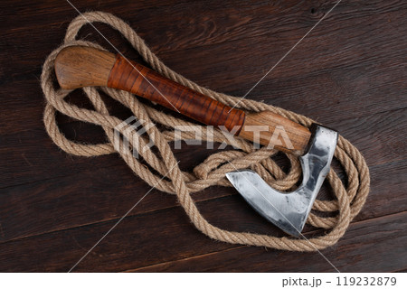 axe on wooden table axe on wooden table 119232879